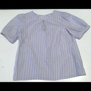 A blue and white striped loose format shirt.